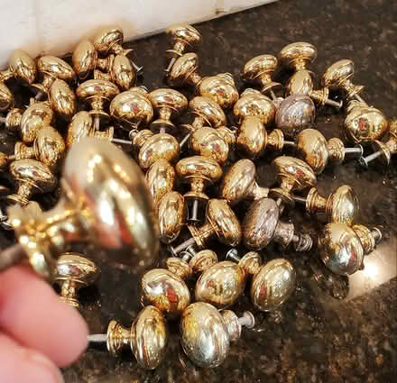 Photo of free Qty 54 Brass ? Metal Cabinet Pulls (Brookhaven) #2