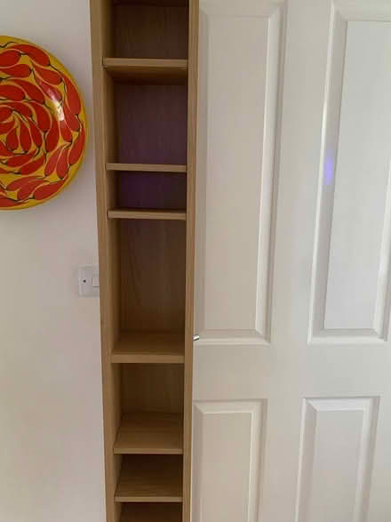 Photo of free Tall wood shelving unit (Idle Bradford) #2