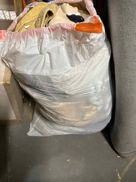 Photo of free Three bags of clothes and towels (Morgan hill) #2