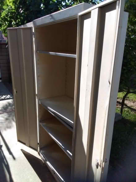 Photo of free TWO Metal cabinets with shelves (Walnut) #1