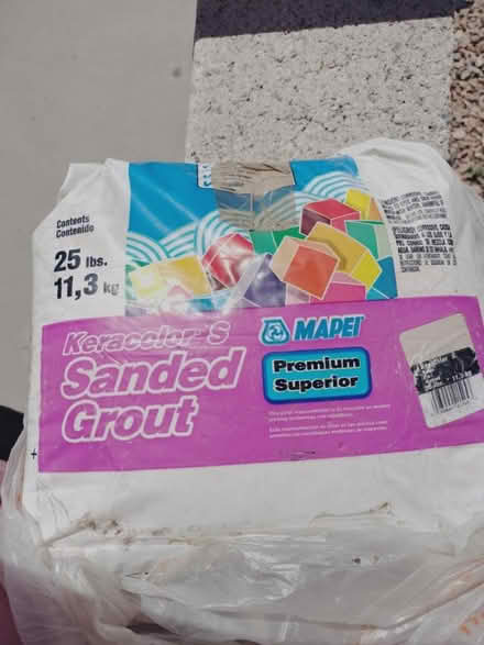 Photo of free Tan grout (Central and Atrisco) #1