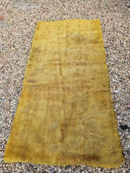 Photo of free Rug. 1.8m x 0.9m. Mustard colour. (Giffnock G46) #1