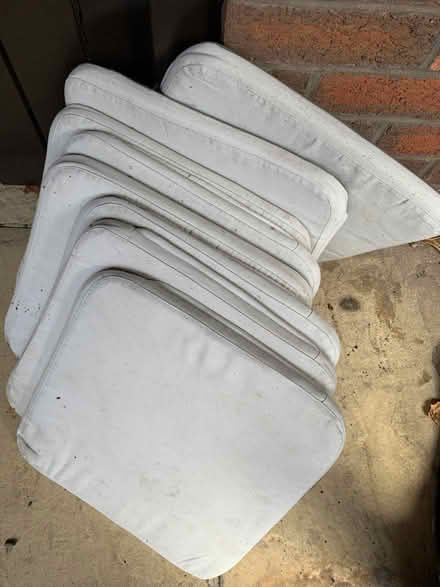 Photo of free 8 chair pads. Removable covers (NG10) #1