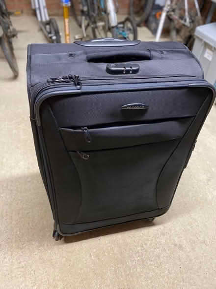 Photo of free Large black suitcase with wheels (Southmoor OX13) #1
