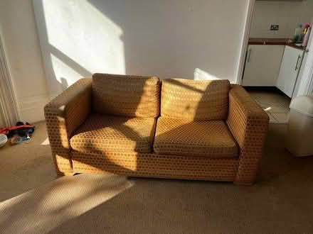 Photo of free double orange sofa (Brighton BN1) #1