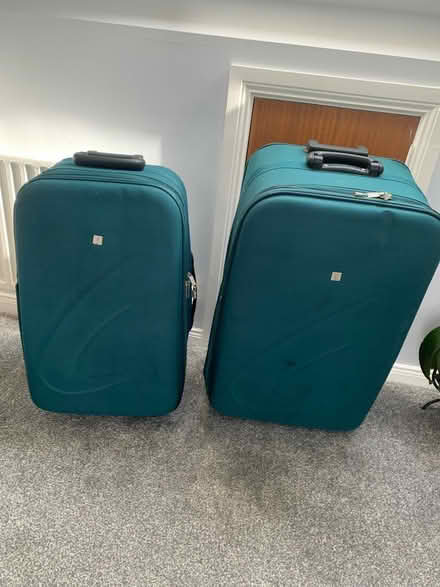 Photo of free Large and Medium suitcases (Lurgan) #1