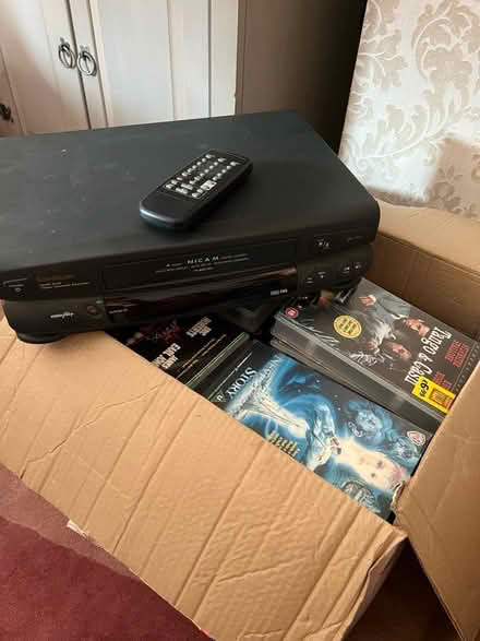 Photo of free VHS player and box of vhs tapes (CR2) #1