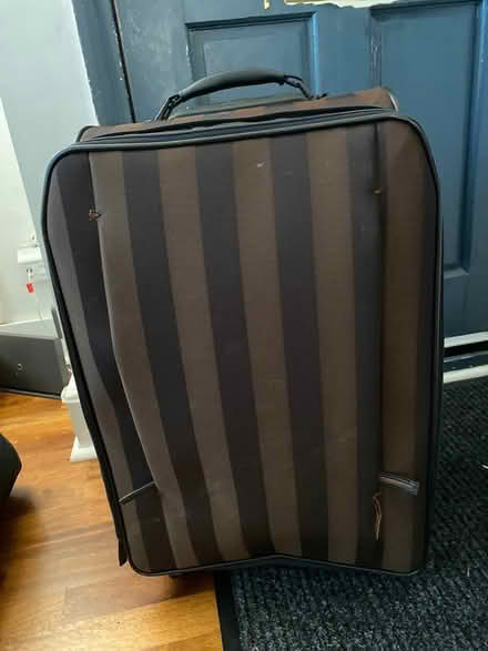 Photo of free Small/ Medium sized suitcase (Hitchin) #1