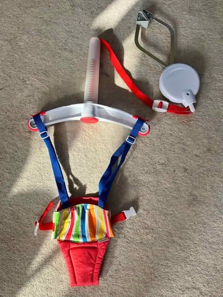 Photo of free Baby bouncer, hanging on door frame (GU1, Warren Road, Guildford) #1