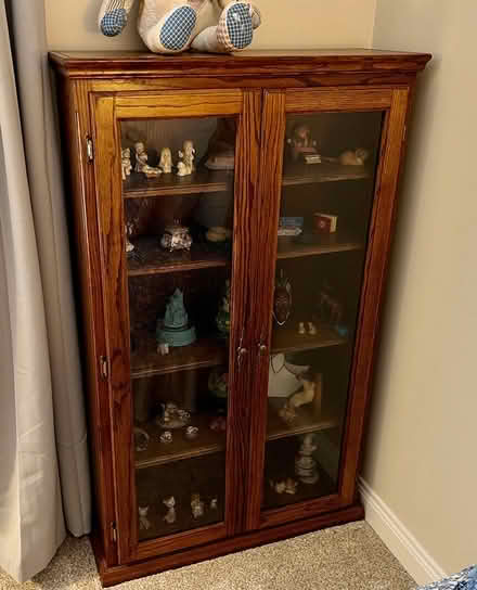 Photo of free Wood and glass curio cabinet (South Kingston, near Rt 125) #1