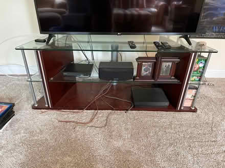 Photo of free Glass and wood TV stand (South Kingston, near Rt 125) #1