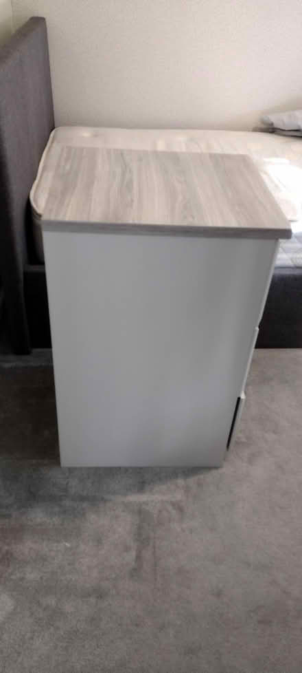 Photo of free Grey 3 drawer narrow chest / bedside cabinet (Gwernymynydd CH7) #1