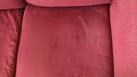 Photo of free Maroon three seater couch (Greenbrae - South Eliseo Drive) #1
