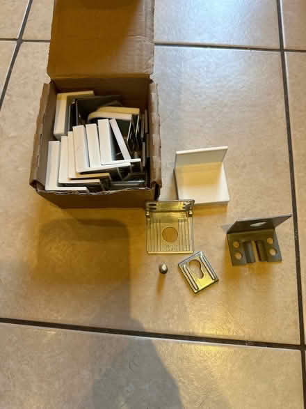 Photo of free Ikea cupboard fixing parts (East Finchley N2) #1