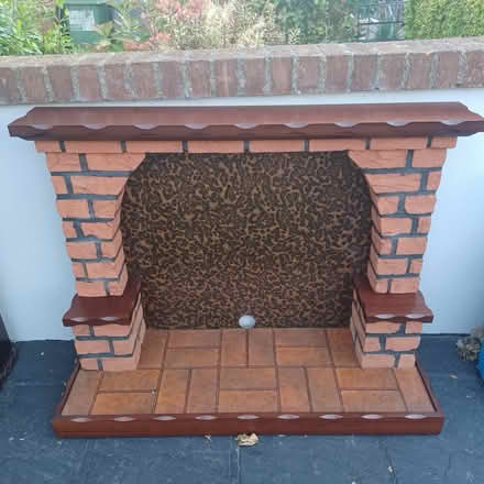 Photo of free Mahogany fireplace & heater (Northside) #2