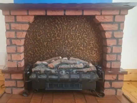 Photo of free Mahogany fireplace & heater (Northside) #3