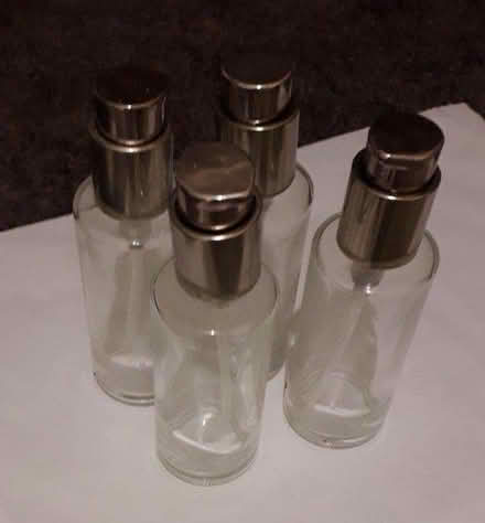 Photo of free Glass bottles with pump dispenser (Streatham Hill. SW2) #1