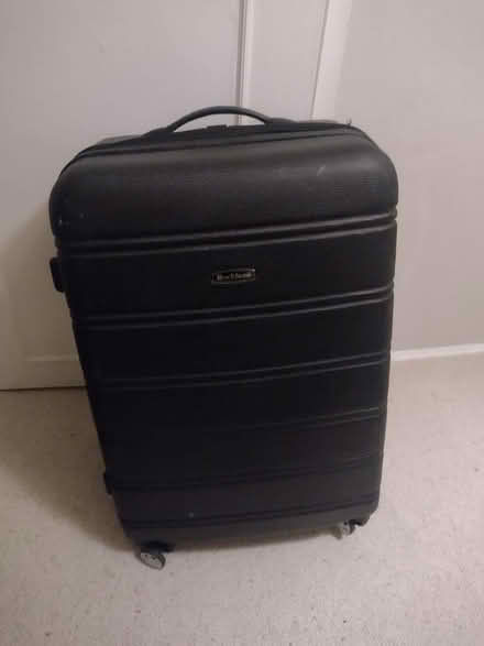 Photo of free Large suitcase - missing wheel (W10 - Ladbroke Grove) #1