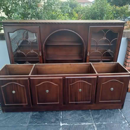 Photo of free Tall mahogany cabinet (Northside) #1