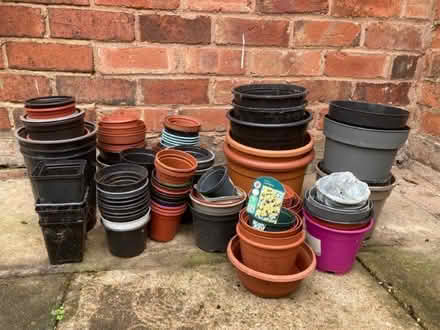 Photo of free Over 80 plastic plant pots in various sizes . (West Midlands B31) #1