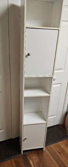 Photo of free Tall white cabinet (19809 Gordon Heights) #1