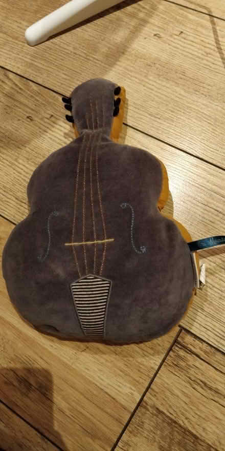 Photo of free Children's toy - guitar or cello (Crouch End N8) #1