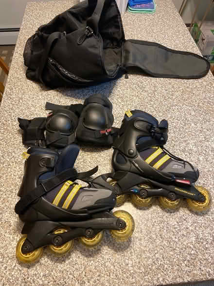 Photo of free Jr Rollerblades Sz 4-7 w/ pads+case (Arlington Near Stratton) #1