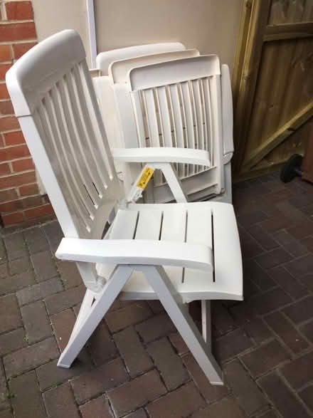 Photo of free Four White Folding Chairs (Headington OX3) #1