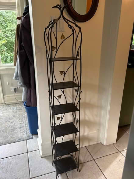 Photo of free Tall metal shelf with vine motiff (NW Evanston) #1