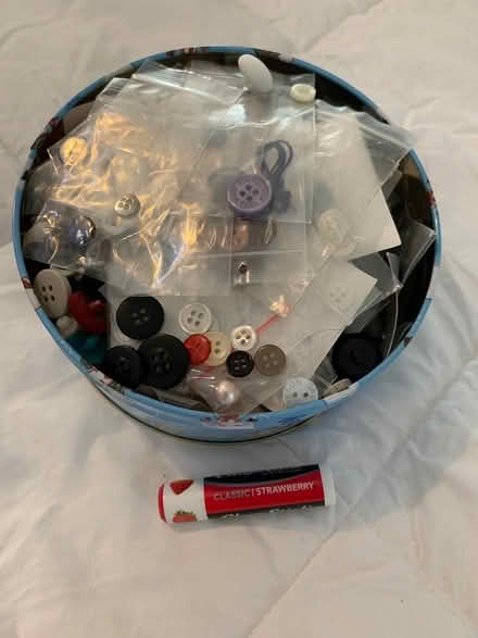 Photo of free Small tin box of assorted buttons (Manassas/Wellington area) #1