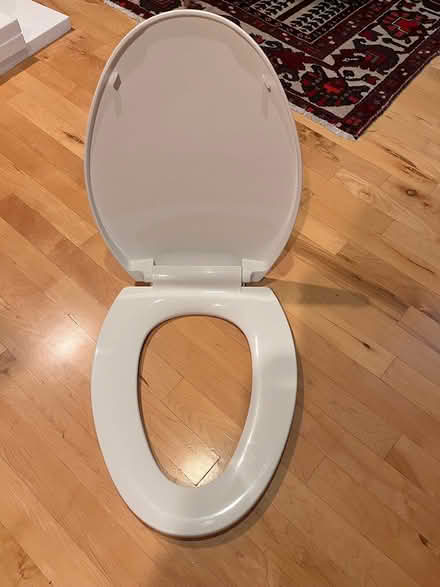 Photo of free New oval toilet seat (Old Ottawa south) #1