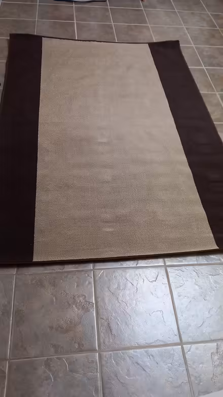 Photo of free Brown and cream rug (Walkern SG2) #2
