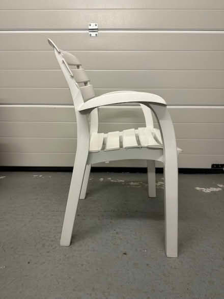 Photo of free Stacking white plastic patio garden chairs (x4) by Allibert. (Rumsam EX32) #3