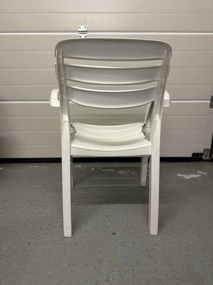 Photo of free Stacking white plastic patio garden chairs (x4) by Allibert. (Rumsam EX32) #4