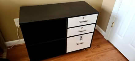 Photo of free File cabinet with shelves (Burtonsville) #1