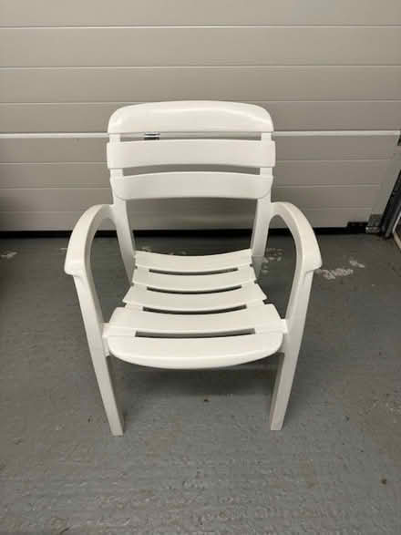 Photo of free Stacking white plastic patio garden chairs (x4) by Allibert. (Rumsam EX32) #1