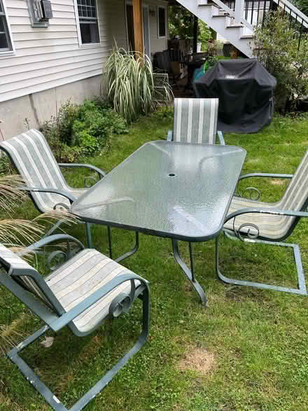 Photo of free Outdoor glass table and 4 chairs (Salem nh) #1