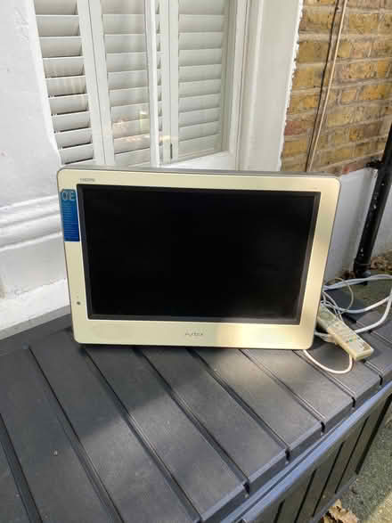 Photo of free White tv with dvd player inbuilt (Mortlake SW14) #1