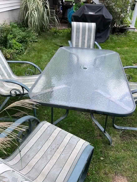Photo of free Outdoor glass table and 4 chairs (Salem nh) #2