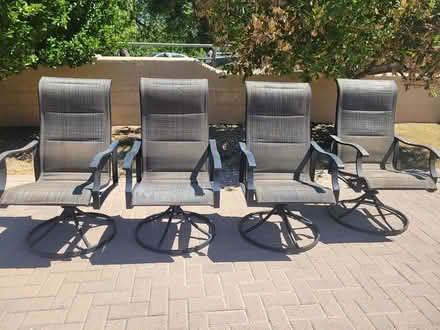 Photo of free Used patio swivel chairs (Dobson & Warner) #1