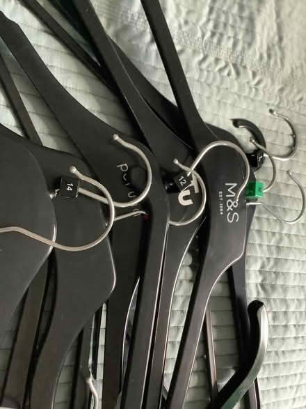 Photo of free Lot of 15 black plastic clothes hangers (BT10) #2
