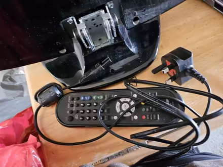 Photo of free Sharpe tv with remote and cable (Horsham) #2