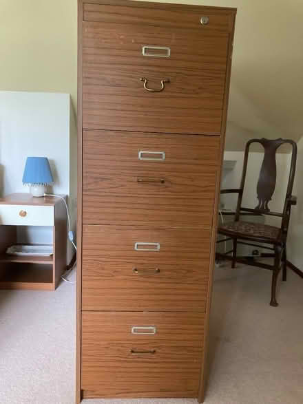 Photo of free Wood effect four draw filing cabinet (Cheltenham GL53) #1