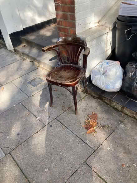 Photo of free Brown wooden chair going free outside 116 Baron’s court road (Barons Court W14) #1