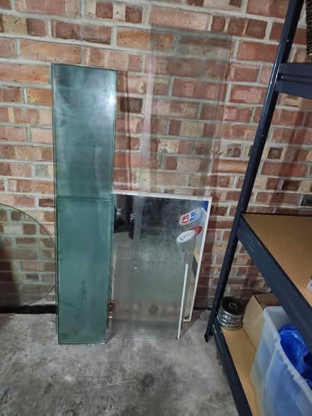 Photo of free Heavy duty thick glass shelves complete with holders (Canary Wharf E14) #1