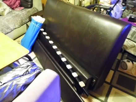 Photo of free 4ft 6in faux leather brown bed frame ,wooden slats , (Woodchurch CH49) #1