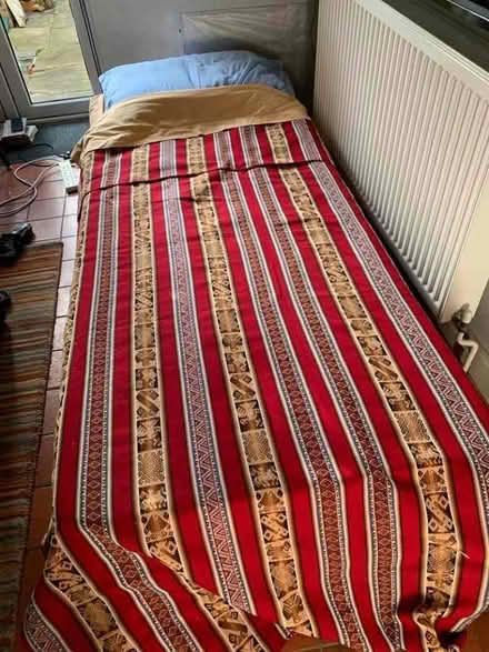 Photo of free Low level single (2'6" wide x 6'3") bed on wheels (islington N1) #4