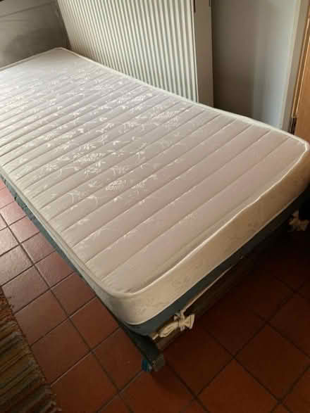 Photo of free Low level single (2'6" wide x 6'3") bed on wheels (islington N1) #3