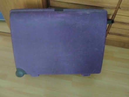 Photo of free Large purple suicase (Horsell, Woking) #1