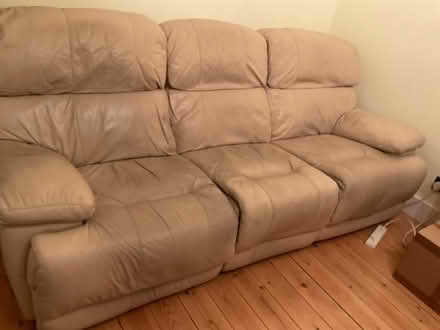 Photo of free Tatty leather sofa, needs repair (Chalk Farm NW1) #1